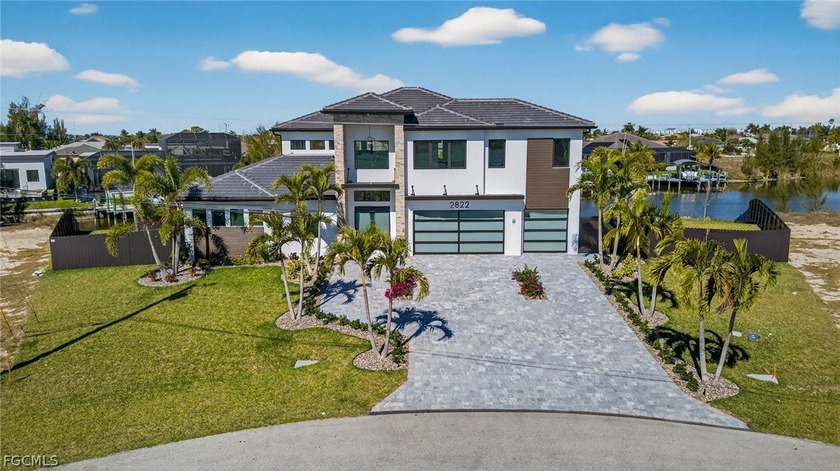 Presenting a brand-new construction, two-story masterpiece on a - Beach Home for sale in Cape Coral, Florida on Beachhouse.com