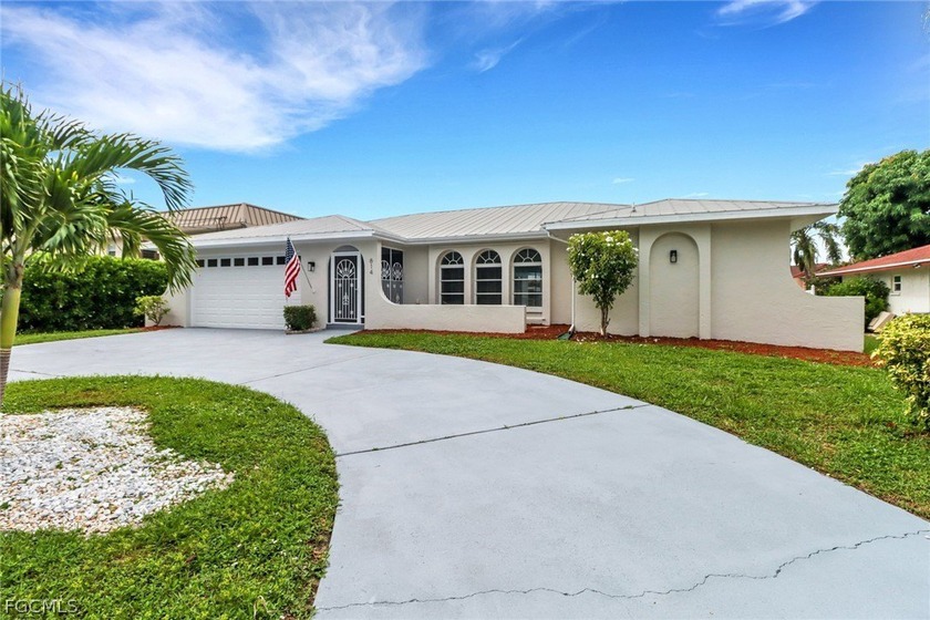 MUST SEE INSIDE!!! FULLY RENOVATED POOL HOME ON THE CANAL WITH - Beach Home for sale in Cape Coral, Florida on Beachhouse.com