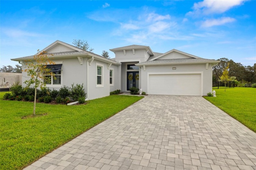 Welcome Home to this Stunning One Story Pond Front Home located - Beach Home for sale in Spring Hill, Florida on Beachhouse.com