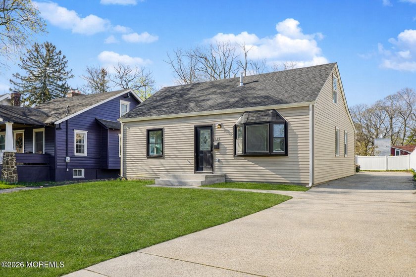 Completely reimagined from top to bottom, this 4-bedroom, 3-bath - Beach Home for sale in Oakhurst, New Jersey on Beachhouse.com