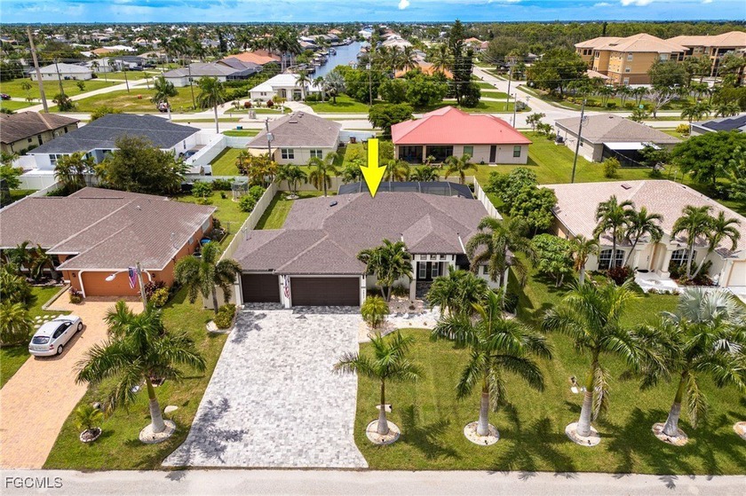 **STUNNING SALT-WATER POOL HOME WITH OUTDOOR KITCHEN TO ENJOY - Beach Home for sale in Cape Coral, Florida on Beachhouse.com