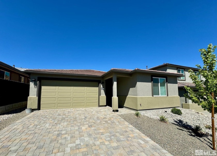 MOVE-IN READY! This new 4 bedroom, 2.5 bath home comes with - Beach Home for sale in Reno, Nevada on Beachhouse.com