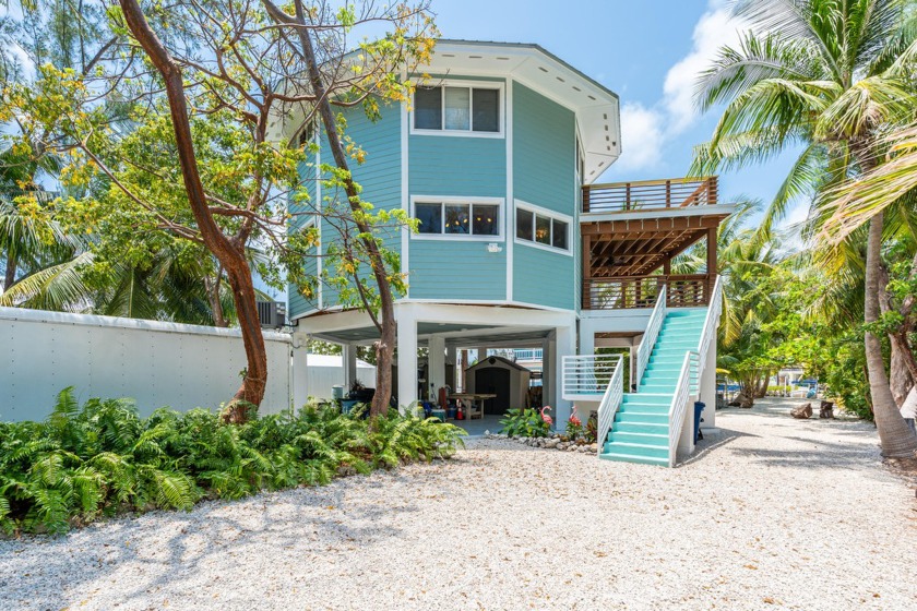 Tropical paradise waterfront home opportunity, awaits your - Beach Home for sale in Key Largo, Florida on Beachhouse.com