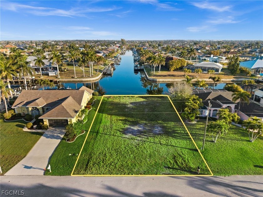 RARE INTERSECTING CANAL GULF ACCESS LOT WITH A NEW SEAWALL - - Beach Lot for sale in Cape Coral, Florida on Beachhouse.com