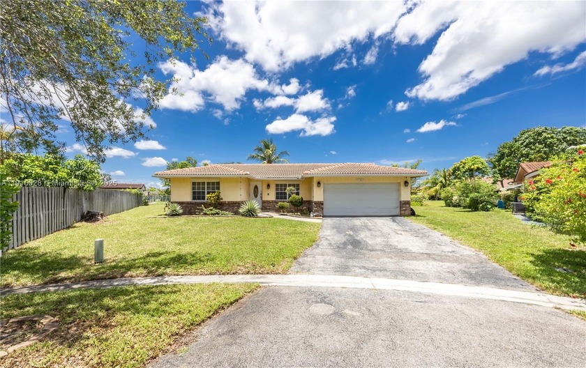 Welcome to this spacious 3-bedroom, 2-bath home featuring a - Beach Home for sale in Coral Springs, Florida on Beachhouse.com