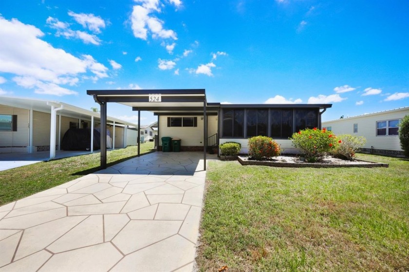 Welcome to 524 Queensway Rd East in the award winning 55+ - Beach Home for sale in Port Charlotte, Florida on Beachhouse.com