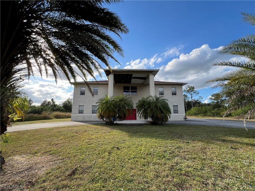 Two-story house built in 2007 offering 5 bedrooms, 3.5 baths, 3 - Beach Home for sale in Lehigh Acres, Florida on Beachhouse.com