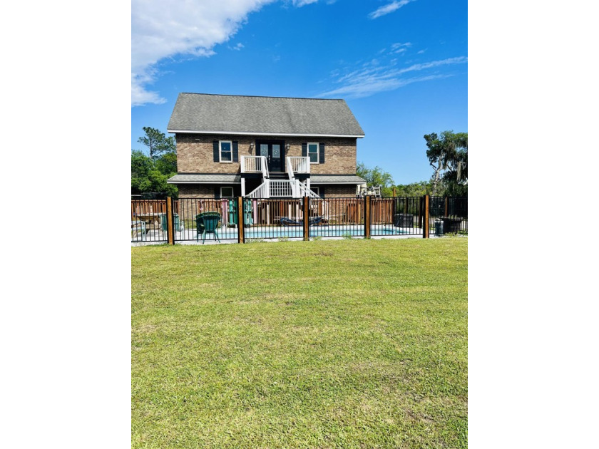 WATERFRONT HOME Completely updated 2023-2024 w/6.77 acres - Beach Home for sale in Meggett, South Carolina on Beachhouse.com