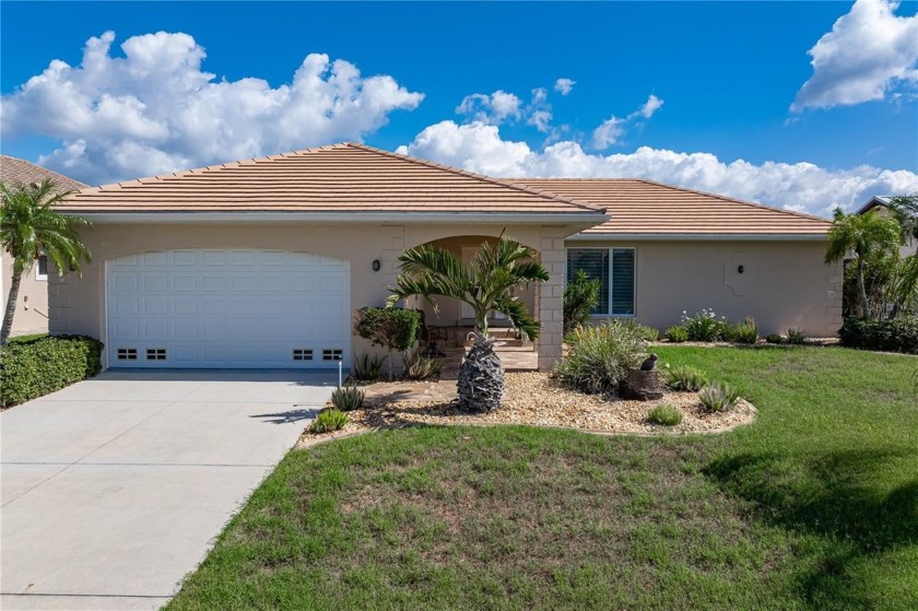 UPDATED SAILBOAT ACCESS STUNNER IN PUNTA GORDA ISLES W/QUICK - Beach Home for sale in Punta Gorda, Florida on Beachhouse.com