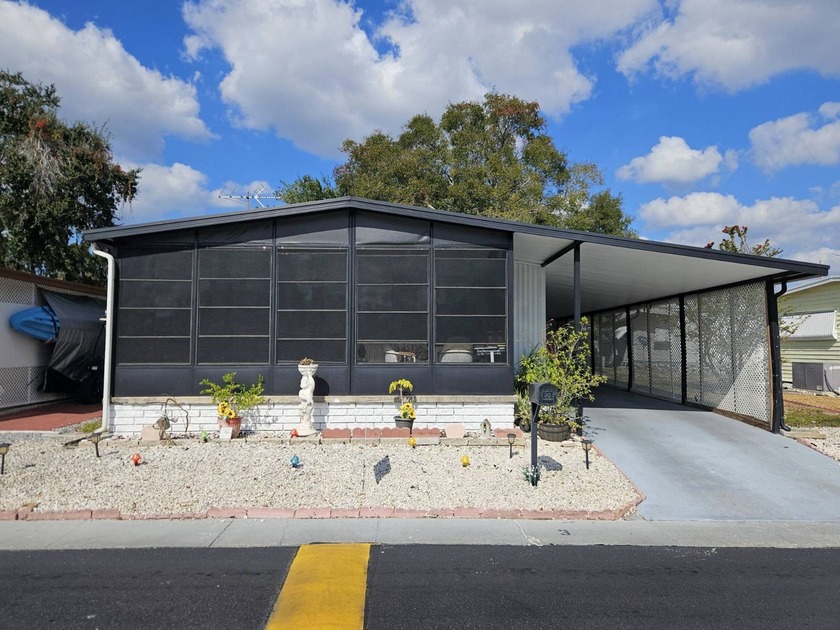 **Super Large Doublewide Priced to Sell Right Now**  Get out of - Beach Home for sale in New Port Richey, Florida on Beachhouse.com