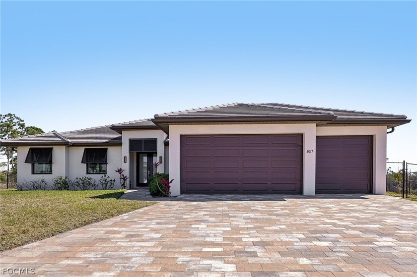 Newer construction concrete block home on beautiful Lake Tyre - Beach Home for sale in Cape Coral, Florida on Beachhouse.com