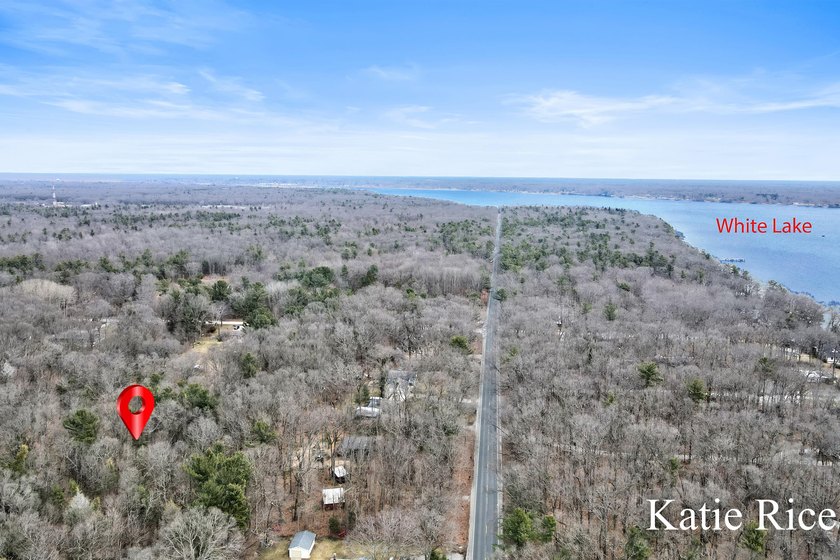 This private and beautifully wooded acreage would be the perfect - Beach Acreage for sale in Montague, Michigan on Beachhouse.com