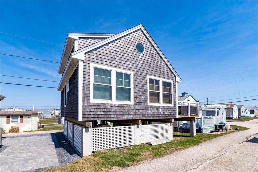 Welcome to your coastal escape in the desirable Roy Carpenter's - Beach Home for sale in South Kingston, Rhode Island on Beachhouse.com