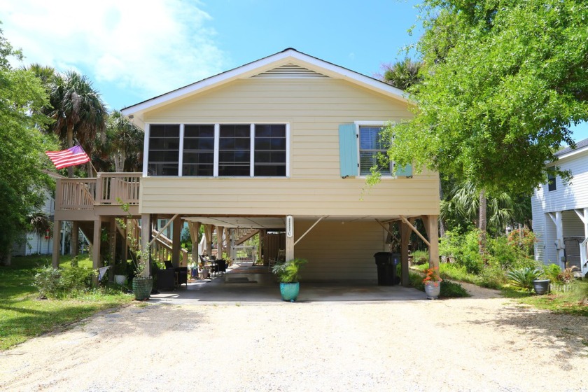 Tucked away on a quiet side street, this 6th row cottage has - Beach Home for sale in Edisto Island, South Carolina on Beachhouse.com