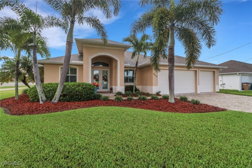 Welcome to your dream home in the heart of highly desirable SW - Beach Home for sale in Cape Coral, Florida on Beachhouse.com