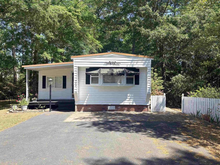 Located in a desirable 55+ community on the south end of the - Beach Home for sale in Murrells Inlet, South Carolina on Beachhouse.com