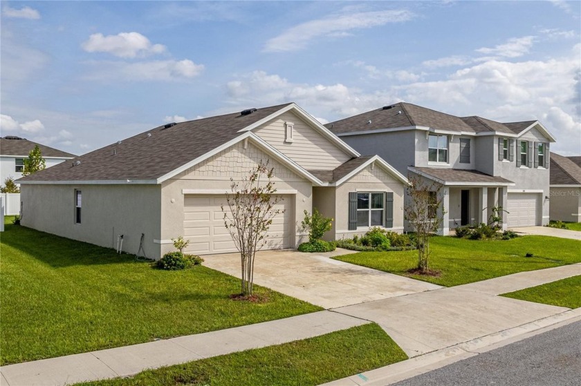 Built in 2022 and move-in ready, make this 4 bd, 2 ba, 2-car - Beach Home for sale in Spring Hill, Florida on Beachhouse.com