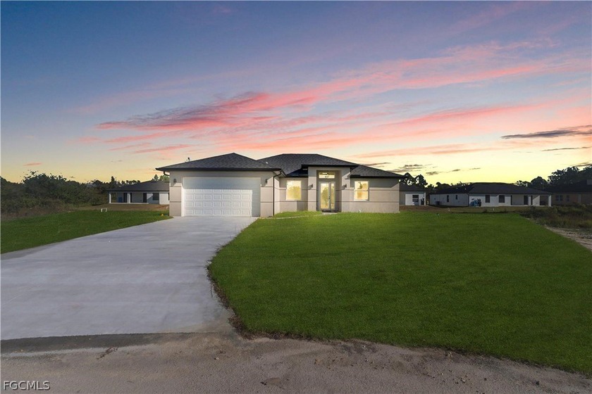 Experience the elegance of brand-new construction in this - Beach Home for sale in Lehigh Acres, Florida on Beachhouse.com