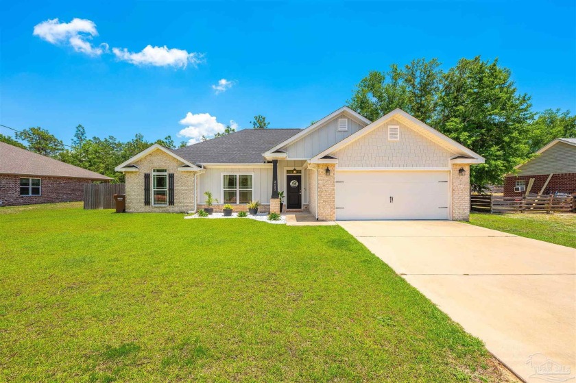 Built in 2019, this well maintained 4 bedroom home offers a - Beach Home for sale in Navarre, Florida on Beachhouse.com