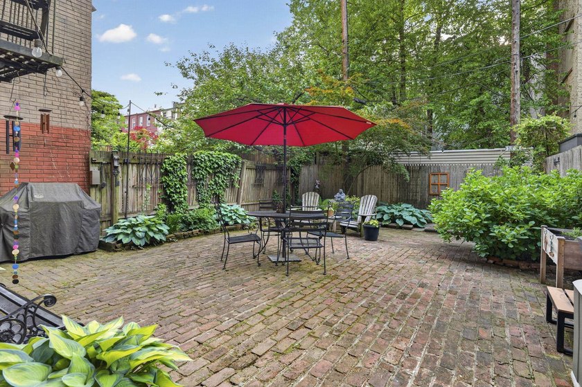 An expansive private backyard with brick patio and lush - Beach Condo for sale in Hoboken, New Jersey on Beachhouse.com