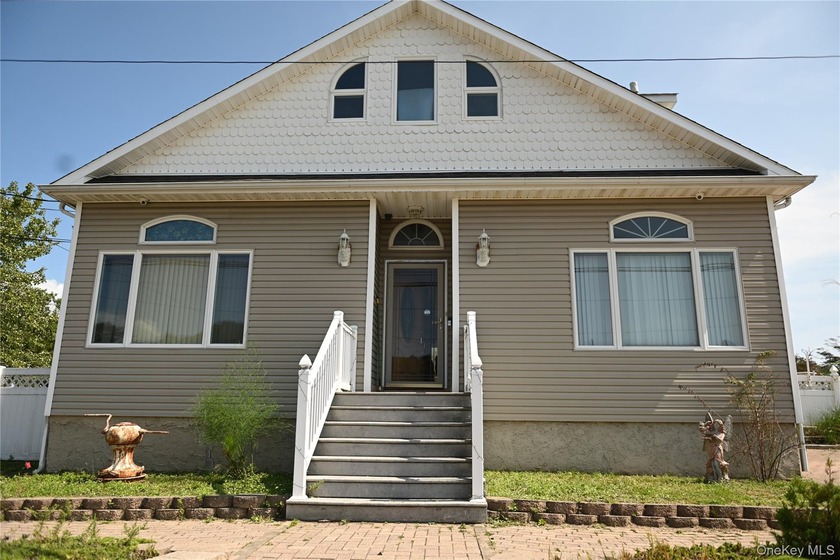 Price Improvement! Now $599,999 - Prime corner lot directly - Beach Home for sale in Mastic Beach, New York on Beachhouse.com