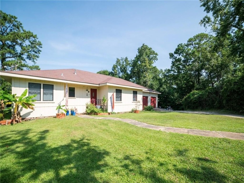 This home is nestled in at the end of a cul-de-sac, and has 348 - Beach Home for sale in Mobile, Alabama on Beachhouse.com