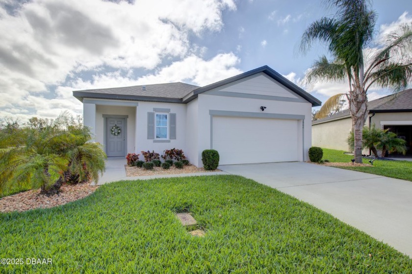 LOCATION LOCATION LOCATION! This 3/2 lakefront home in Coastal - Beach Home for sale in New Smyrna Beach, Florida on Beachhouse.com