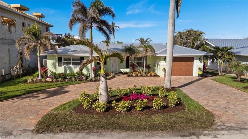Breathtaking Intersecting Canal Water View Home with Sparkling - Beach Home for sale in Fort Myers Beach, Florida on Beachhouse.com