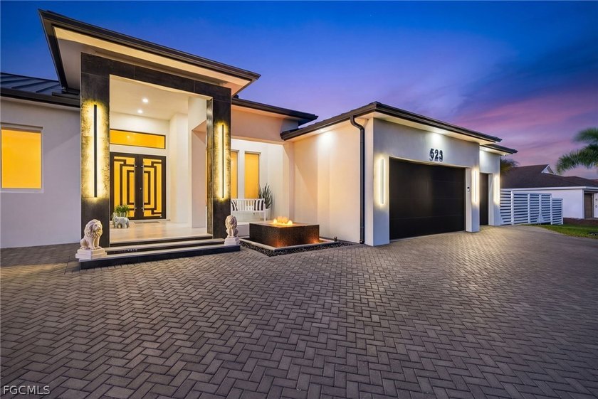WELCOME to this STUNNING & MODERN 2024 Built Home offering the - Beach Home for sale in Cape Coral, Florida on Beachhouse.com