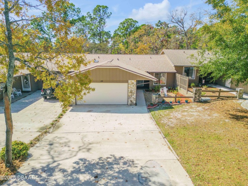 Tucked away in the highly desirable Summertrees 55+ community of - Beach Home for sale in Port Orange, Florida on Beachhouse.com