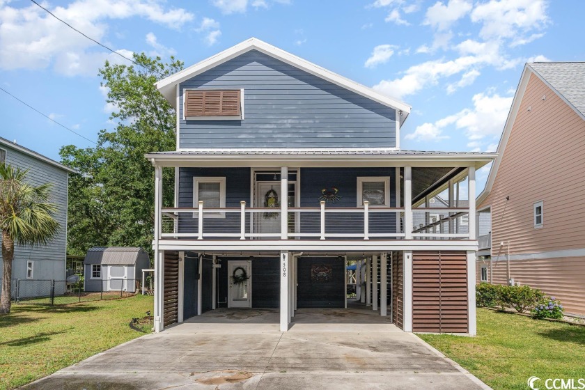 This stunning raised Beach House in Cherry Grove is located only - Beach Home for sale in North Myrtle Beach, South Carolina on Beachhouse.com