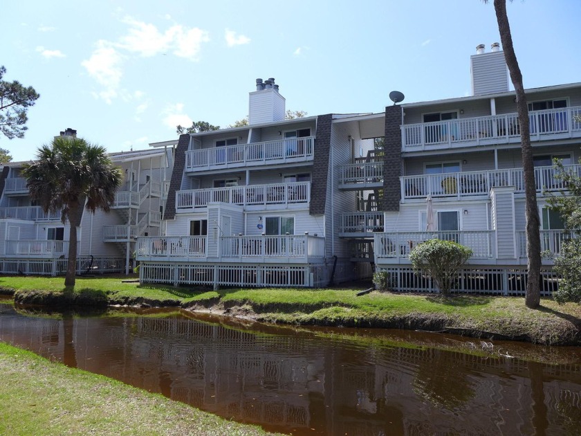 Inviting top floor villa offering sweeping views of the golf - Beach Home for sale in Edisto Island, South Carolina on Beachhouse.com