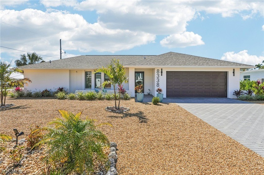 Stunning 3/2/2 waterfront pool home offering direct Gulf access - Beach Home for sale in Fort Myers Beach, Florida on Beachhouse.com