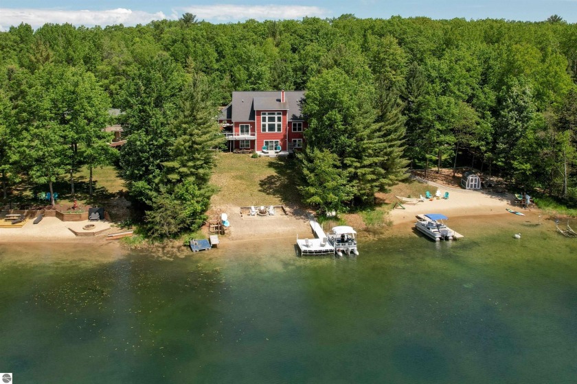 Gorgeous home with 100' of private water frontage on beautiful - Beach Home for sale in Traverse City, Michigan on Beachhouse.com