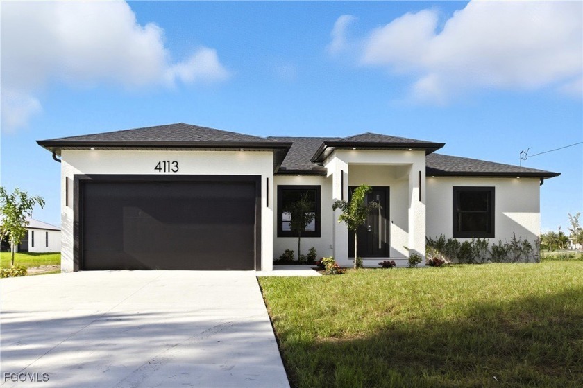 Brand-new 4 BR + den, 3 BA ranch-style home in one of Cape - Beach Home for sale in Cape Coral, Florida on Beachhouse.com