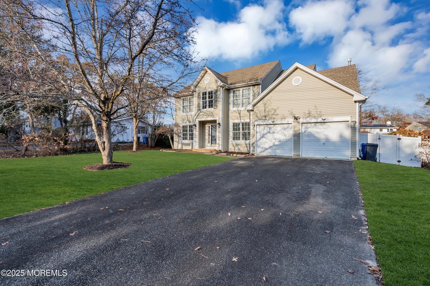 Welcome to this beautifully updated 4-bedroom, 2.5-bath home - Beach Home for sale in Manahawkin, New Jersey on Beachhouse.com