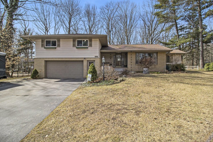 Welcome to this spacious and inviting multi-level home - Beach Home for sale in Ludington, Michigan on Beachhouse.com