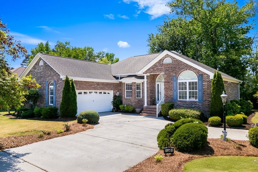 Now offering this spacious 3-bedroom, 2-bath all-brick home with - Beach Home for sale in Longs, South Carolina on Beachhouse.com