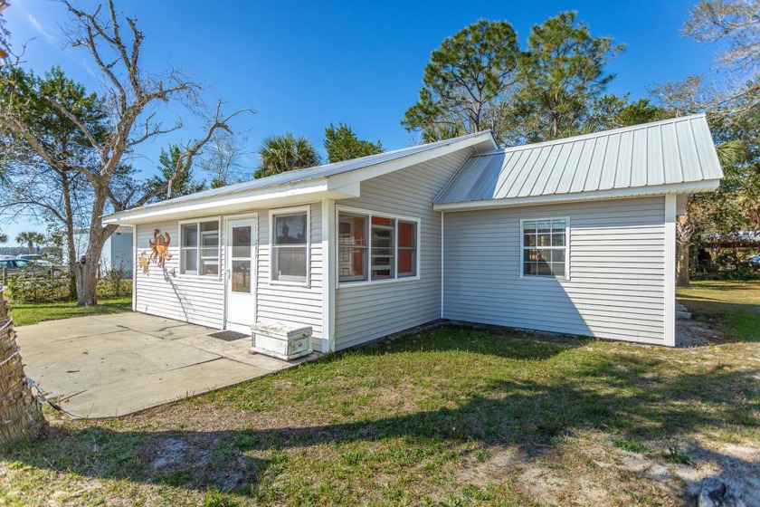 Cute cottage on three lots. Two bedrooms and two bathrooms - Beach Home for sale in Carabelle, Florida on Beachhouse.com
