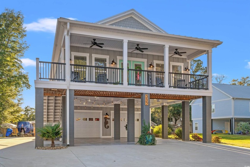 Embrace the perfect blend of luxury and coastal living in this - Beach Home for sale in Murrells Inlet, South Carolina on Beachhouse.com