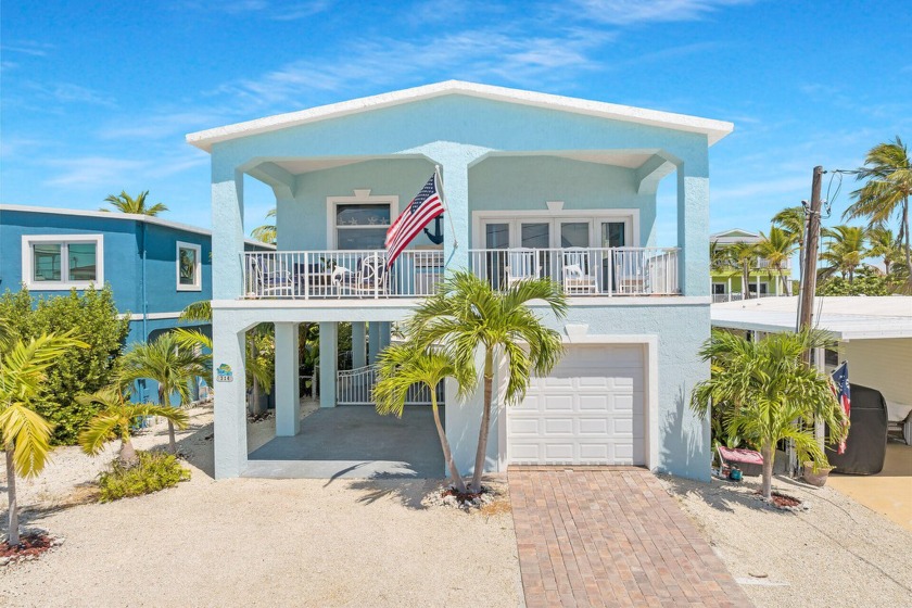 WELCOME TO PARADISE! THIS IMMACULATE HOME WILL MAKE YOU FEEL - Beach Home for sale in Key Largo, Florida on Beachhouse.com