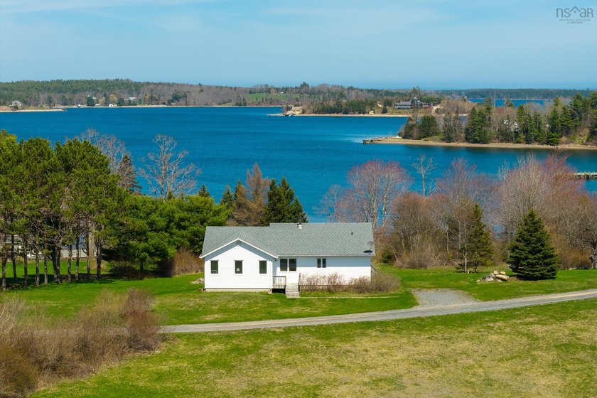 MAGICAL MADERS COVE  Sunny, solid raised bungalow on almost 3 - Beach Home for sale in Maders Cove, Nova Scotia on Beachhouse.com