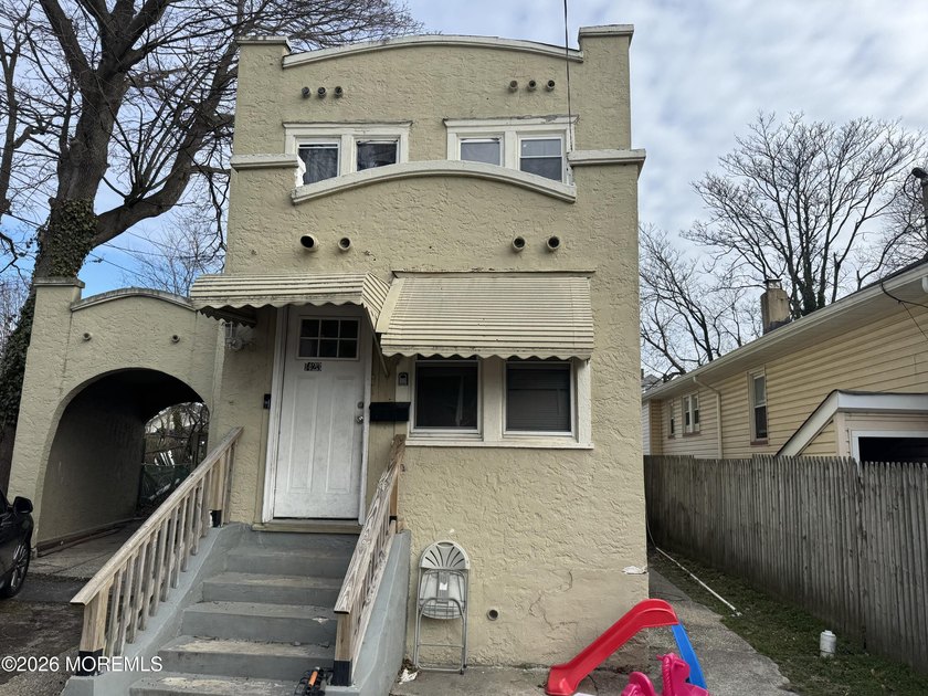 This single family home offers great value. Home is in need of - Beach Home for sale in Asbury Park, New Jersey on Beachhouse.com