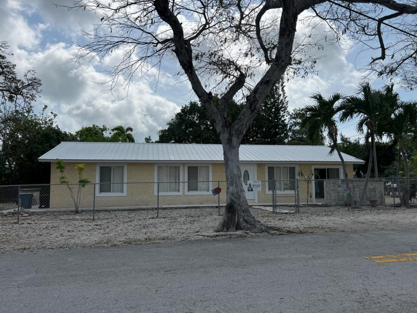 Ground level CBS  construction home featuring 3 bedrooms and 2 - Beach Home for sale in Plantation Key, Florida on Beachhouse.com