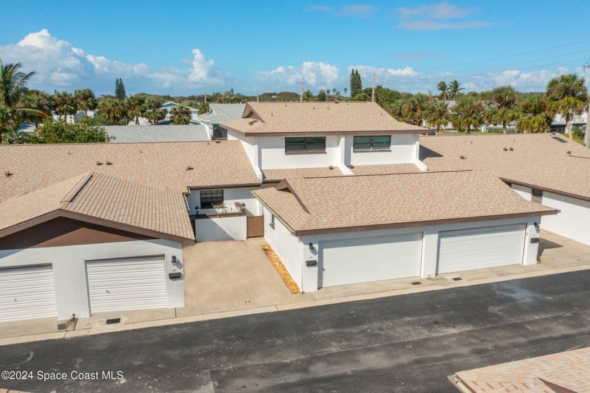 One block from Atlantic Ocean Beaches, this 2 Br., RARE 3 full - Beach Townhome/Townhouse for sale in Indialantic, Florida on Beachhouse.com