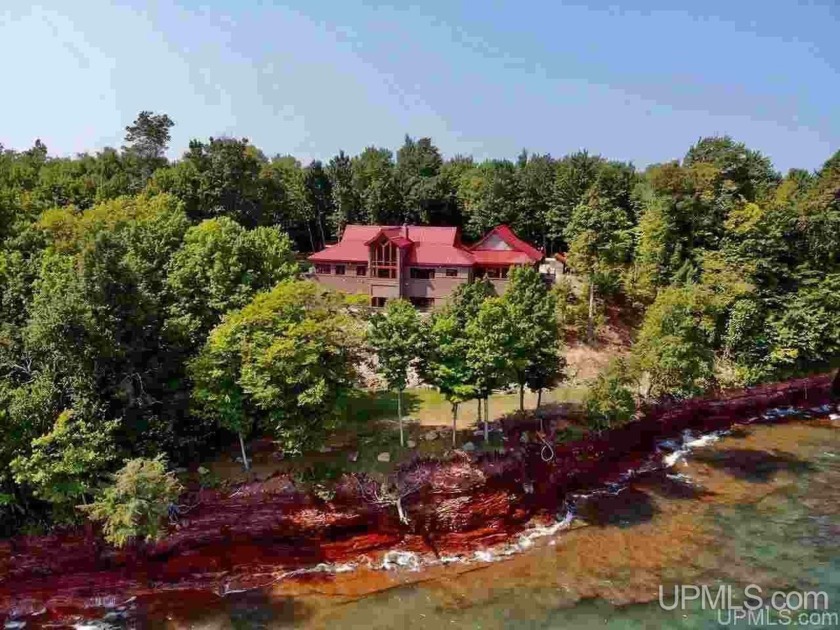 Exquisite living awaits you at this stunning Lake Superior - Beach Home for sale in AU Train, Michigan on Beachhouse.com