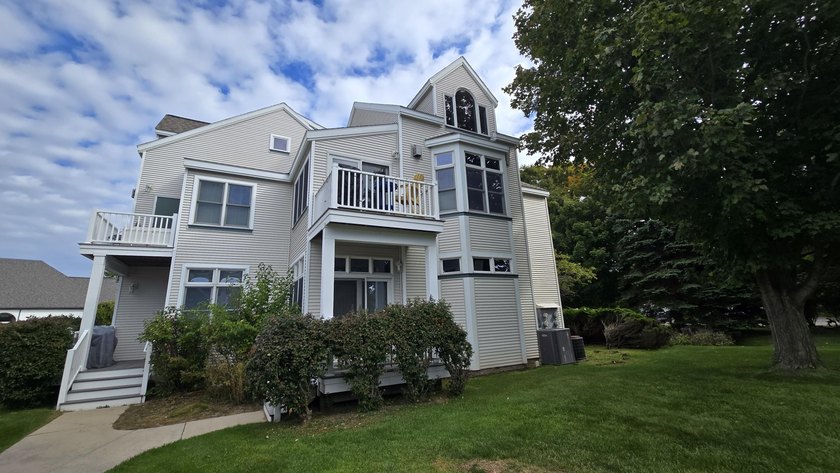 Turnkey investment opportunity in sought-after Harbor Village! - Beach Condo for sale in Manistee, Michigan on Beachhouse.com