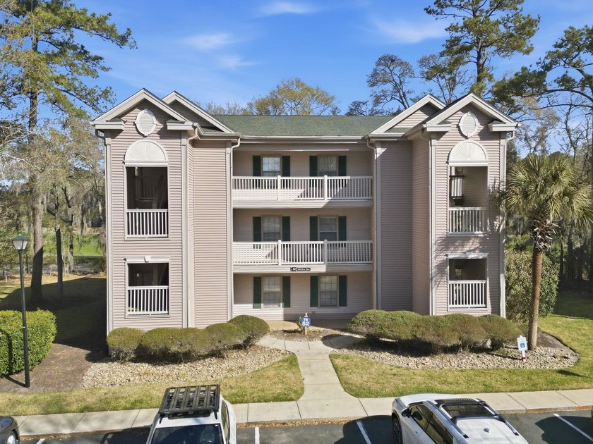 This rare first-floor residence offers a prime location - Beach Condo for sale in Pawleys Island, South Carolina on Beachhouse.com