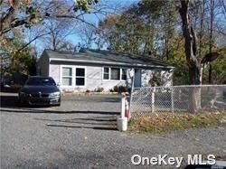Low taxes and updates such as roof, some windows, front door - Beach Home for sale in Bellport, New York on Beachhouse.com