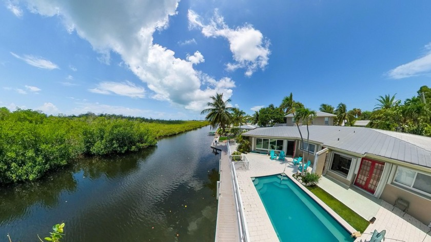 NEW LISTING!  CANAL HOME IN KEY WEST with GARAGE & POOL! - Beach Home for sale in Key West, Florida on Beachhouse.com